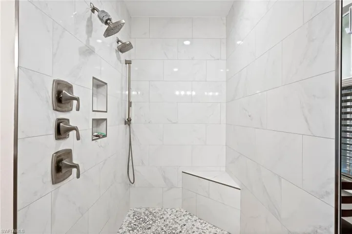 Bathroom with a tile shower