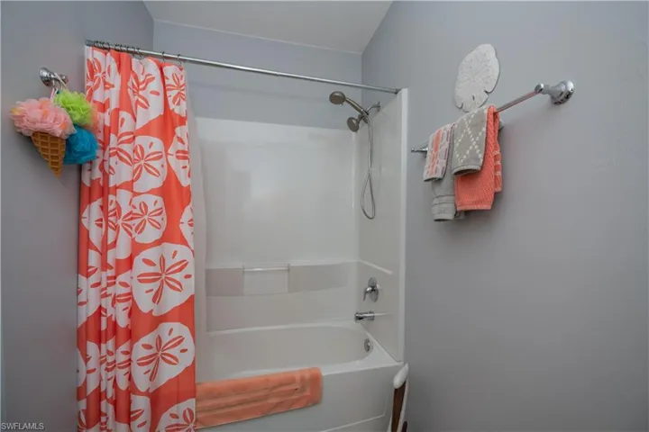 Bathroom featuring shower / tub combo