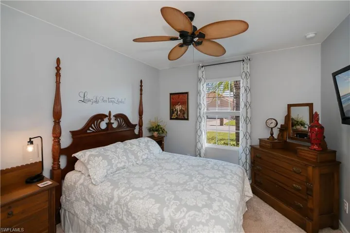 Bedroom featuring carpet flooring and ceiling fan