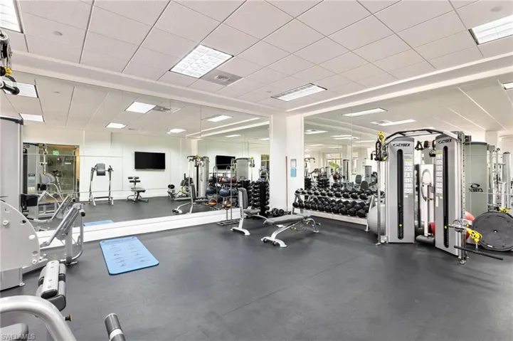 Gym featuring a paneled ceiling
