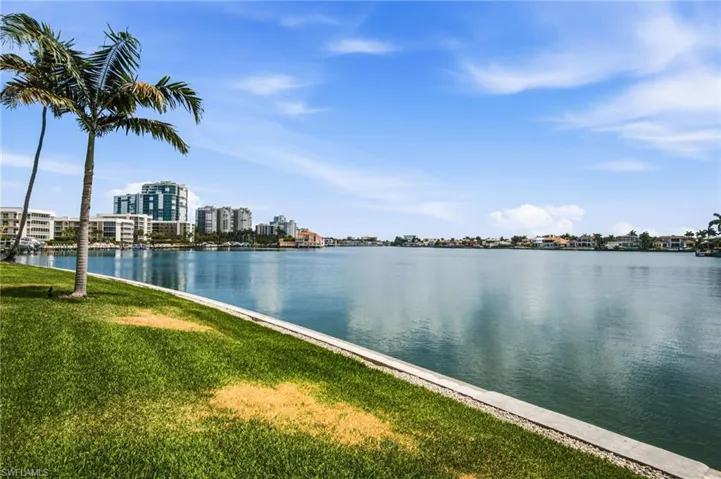 Beautifully maintained 4TH-FLOOR CONDO offers SPECTACULAR BAY VIEWS right outside your front door.