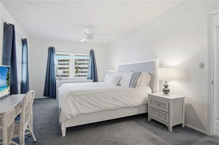 The spacious primary suite has beautiful bay views, a large walk-in closet, and an ensuite bathroom.