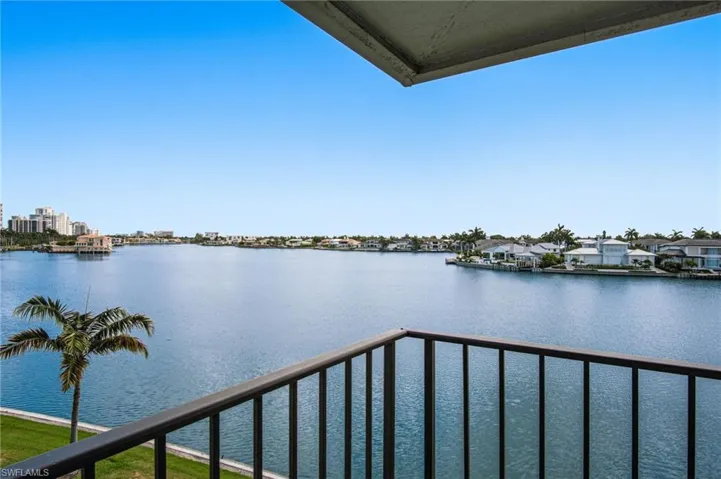 Beautifully maintained 4TH-FLOOR CONDO offers SPECTACULAR BAY VIEWS right outside your front door.