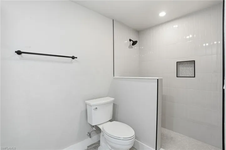 Full bath featuring walk in shower and recessed lighting - Virtually Edited Image