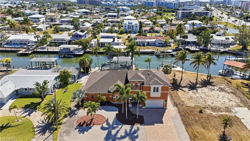 View of urban area featuring a nearby body of water - Virtually Edited Image