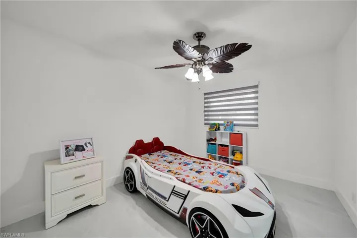 Bright interior room with white walls and light-colored flooring