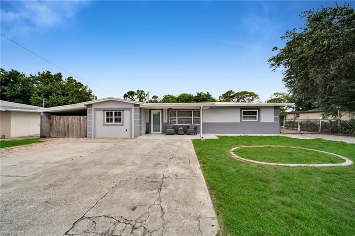 Single-story residence featuring a gray and light gray exterior