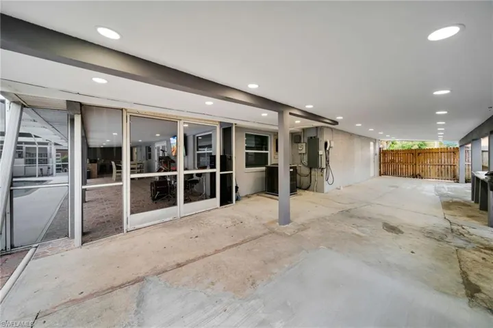 Covered concrete patio with recessed lighting