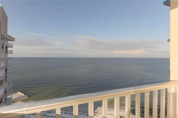 Property view of water with a beach view