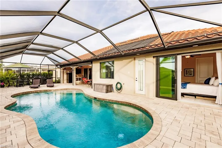 Beautiful Pool Area w/Owner's & Guest Bedrooms & Pool Bath Entry into the House!