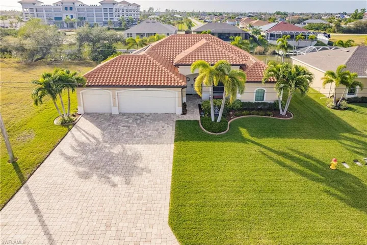 Aerial of Meticulously Landscaped Front of Home!