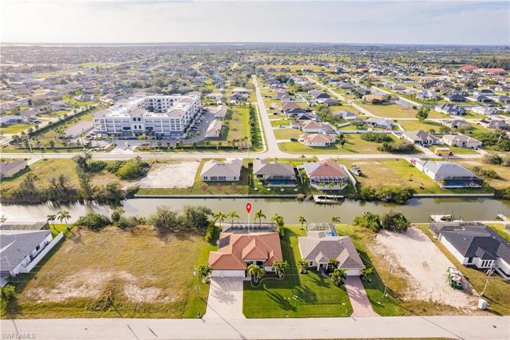 Aerial View of the Front of the House with Canal in background!