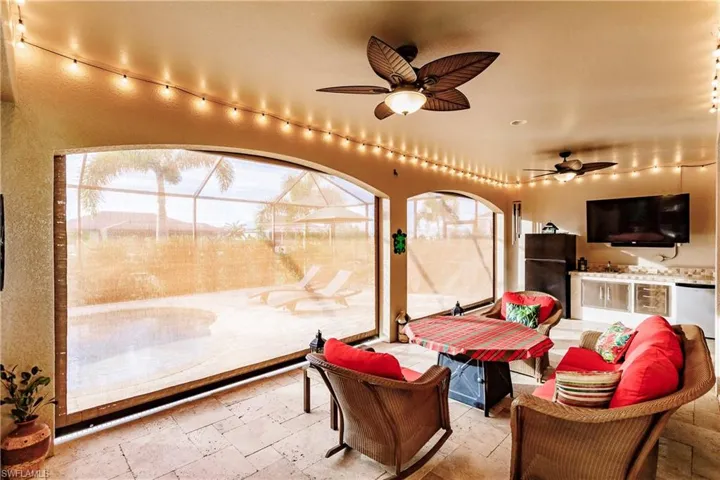 Grand Lanai Area with Remote Control Hurricane Protection Screens!