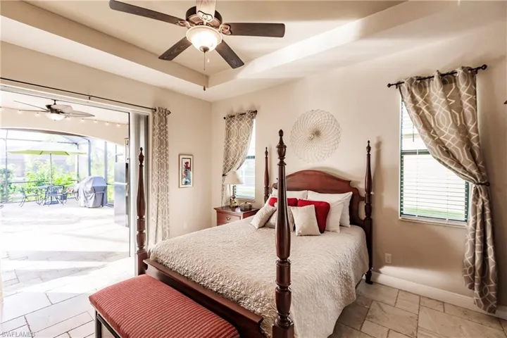 Spacious Owner's Suite with Pocket Sliders to Pool!