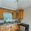 Kitchen featuring crown molding