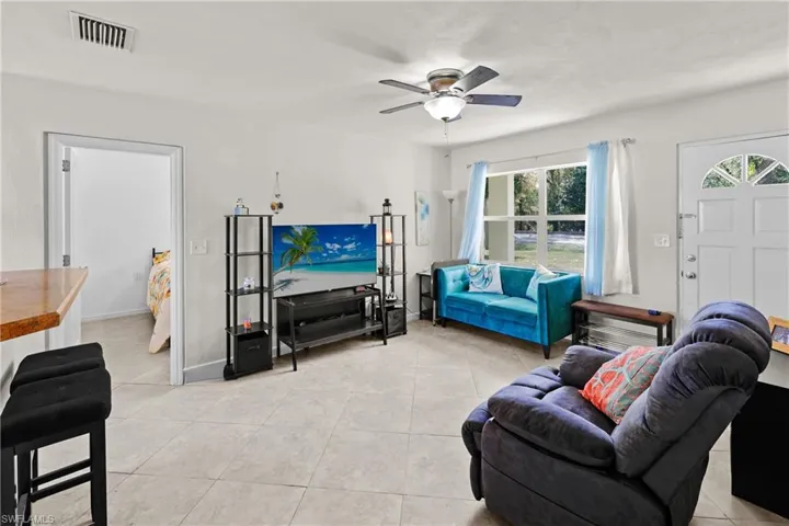 Master bedroom seen beyond living room