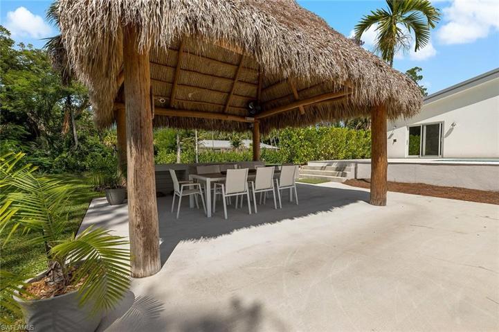 Tiki hut with outdoor kitchen