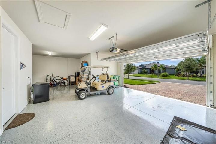 Room for 2 cars, golf cart and workshop.