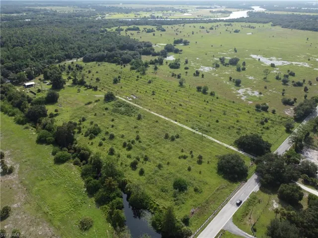 Drone / aerial view with a rural view and a water view