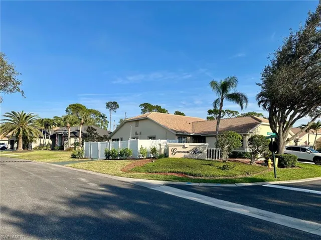 Single story home with a front lawn