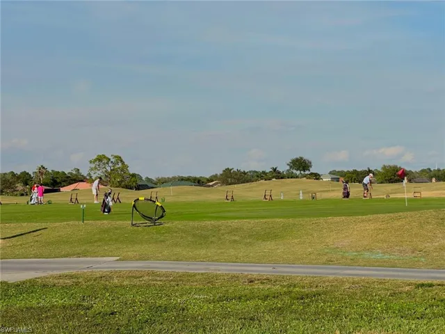 View of home's community featuring a lawn