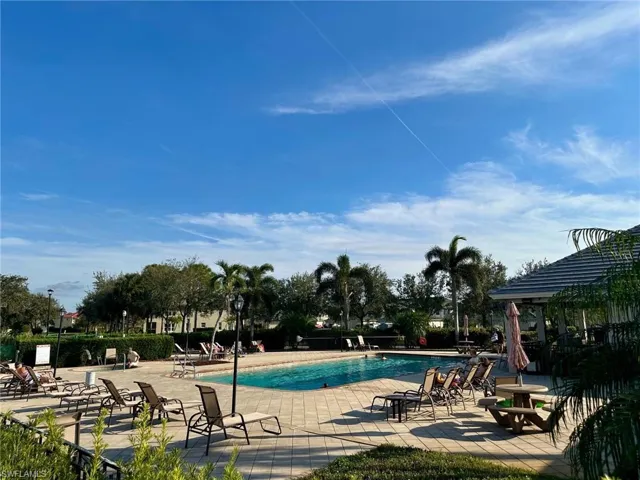 View of swimming pool with a patio area