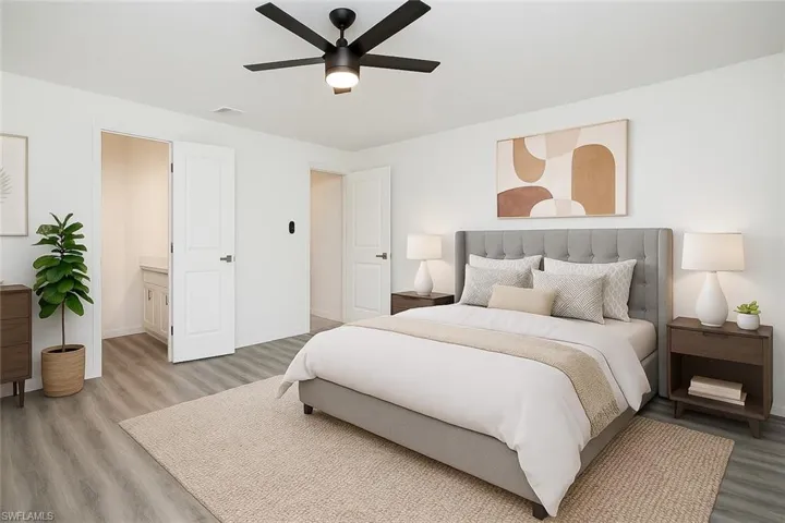 Virtually Staged Bedroom featuring light wood-style floors and a ceiling fan