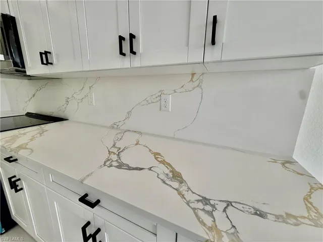 Quartz tops and backsplash.