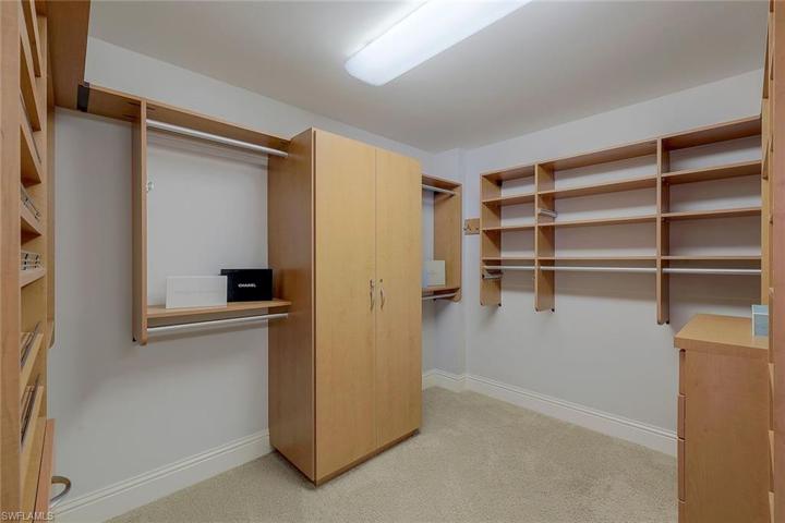 Owner's Suite - His & Hers grand walk-in closet.