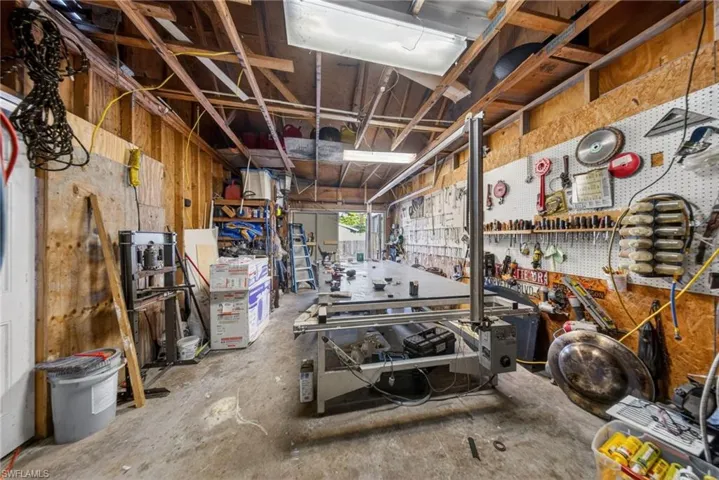 Garage featuring a workshop area