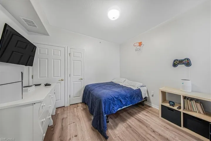 Bedroom with light wood-type flooring