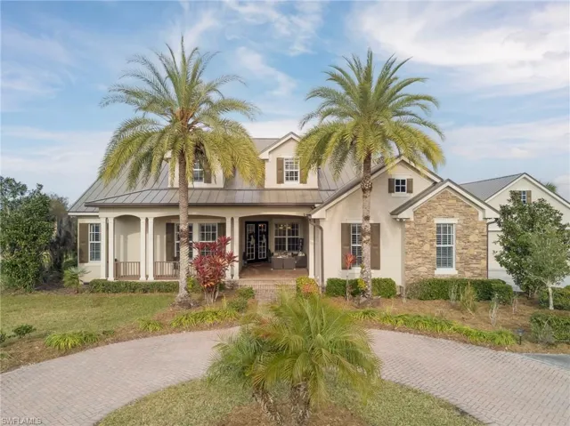 Big Circular Paver Driveway with lots of additional parking by the garages.