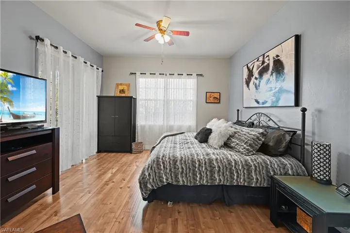 Bedroom featuring light hardwood / wood-style floors.