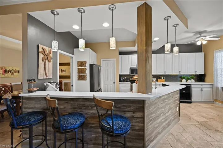 A chefs kitchen with great entertaing space. Lots of cabinets and counter space.