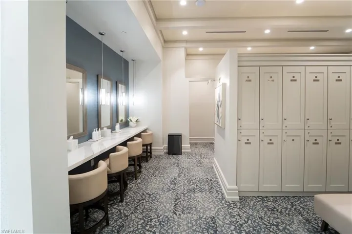 Hallway featuring baseboards and recessed lighting
