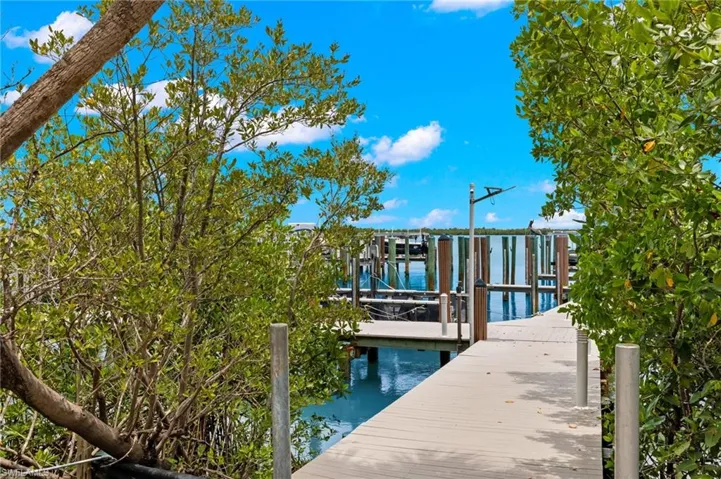 Dock area featuring a water view