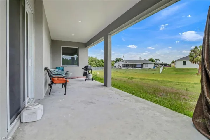 View of patio with area for grilling