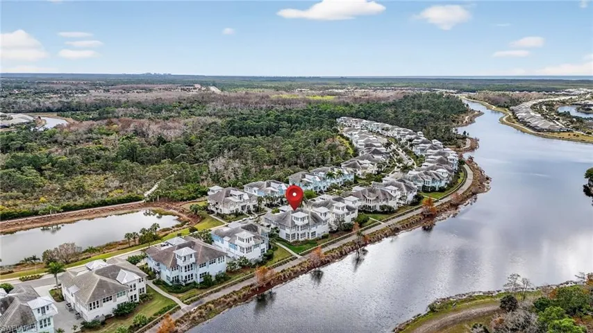 Aerial view of residential area with a nearby body of water