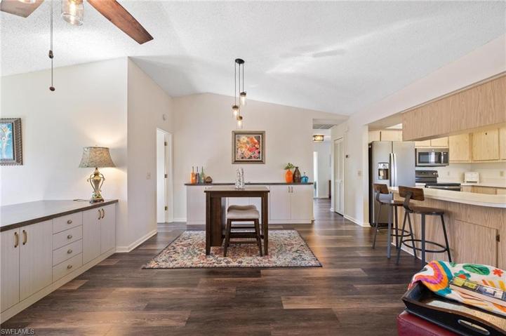 With custom built-in cabinets & desks.
