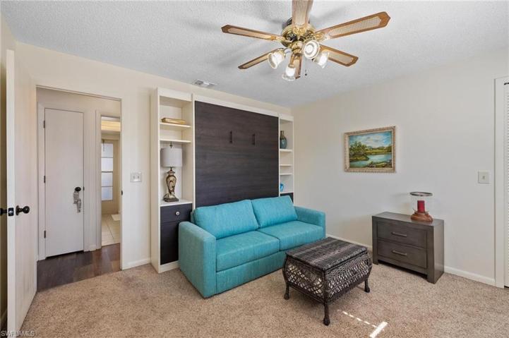 2nd Bedroom with Murphy Bed and walk in closet.