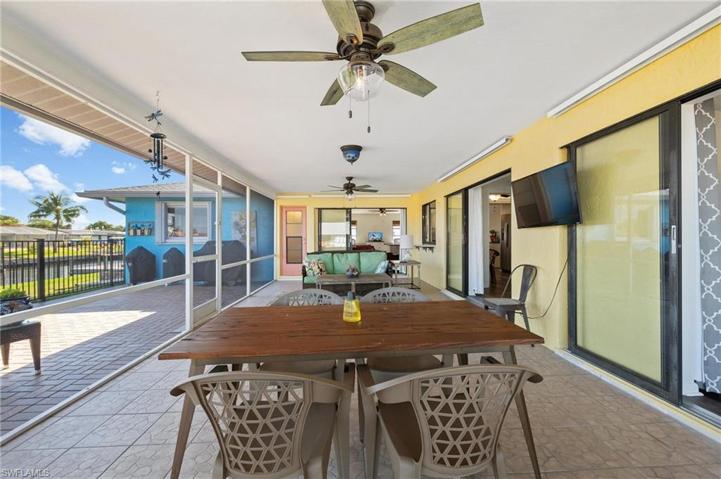 Incredible covered and screened in outdoor living space!