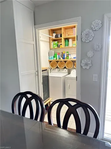 Full size laundry room upstairs off of dining area