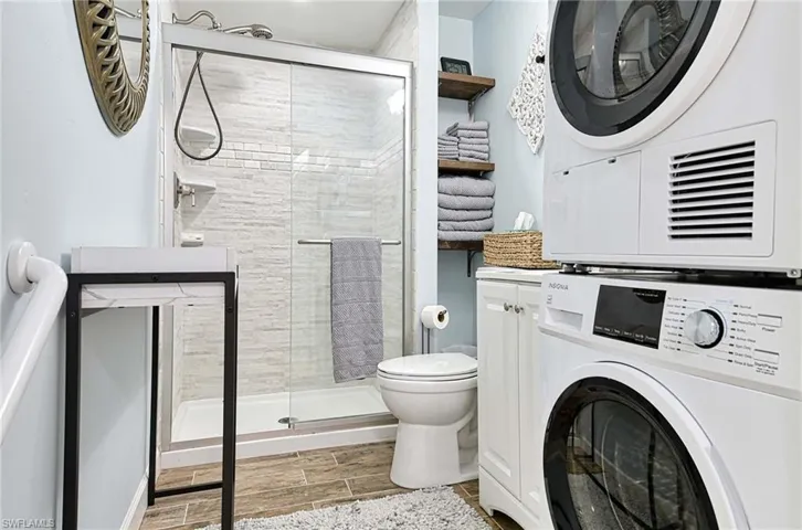 Downstairs bathroom with laundry