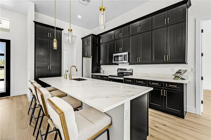 Furnished Kitchen with fun chairs
