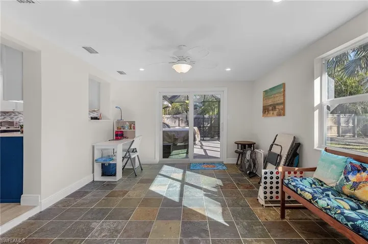 Sitting room featuring ceiling fan