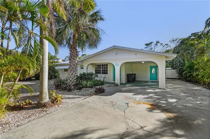 Ranch-style home with a carport