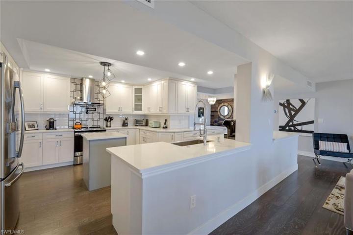 Notice the intricate detail of the backsplash, particularly above the oven!