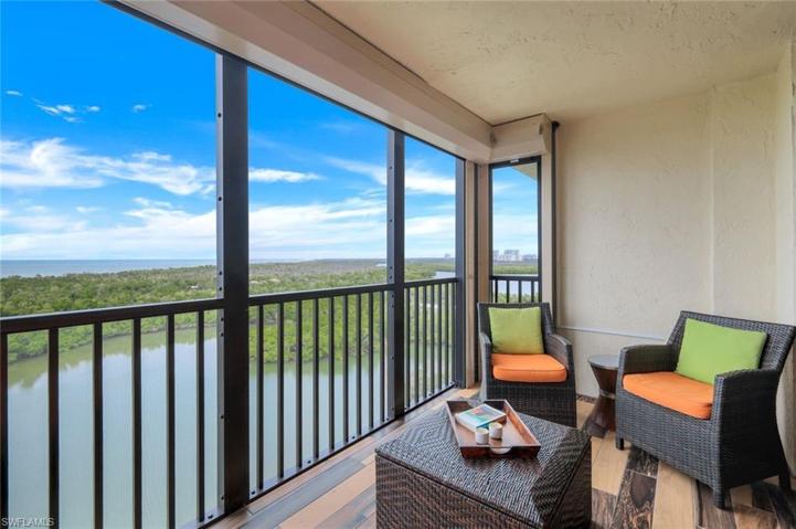 Relax on your lanai as the dolphin frolic below!