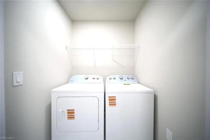 Brand New Washer & Dryer In The Laundry Room With Metal Shelving!