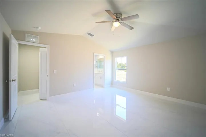 The Master Bedroom Has Vaulted Ceiling, Large Baseboards, Oversized White Porcelain Tile, And A Huge Walk-In Master Closet!